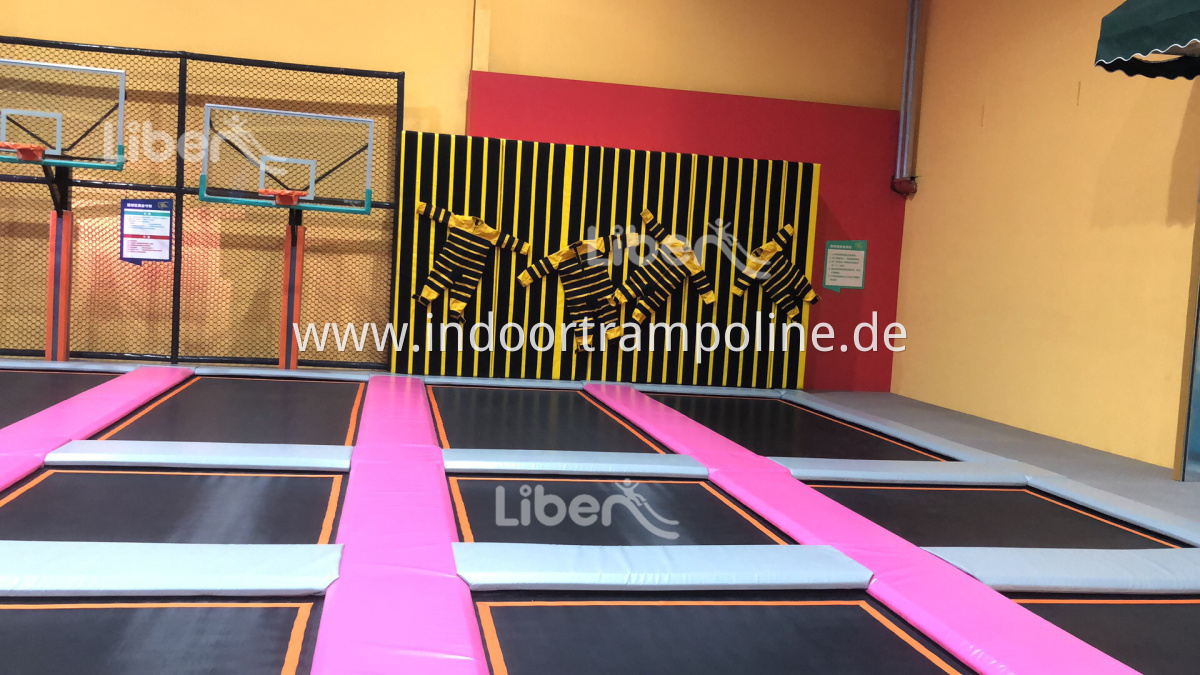 big trampoline with basketball area